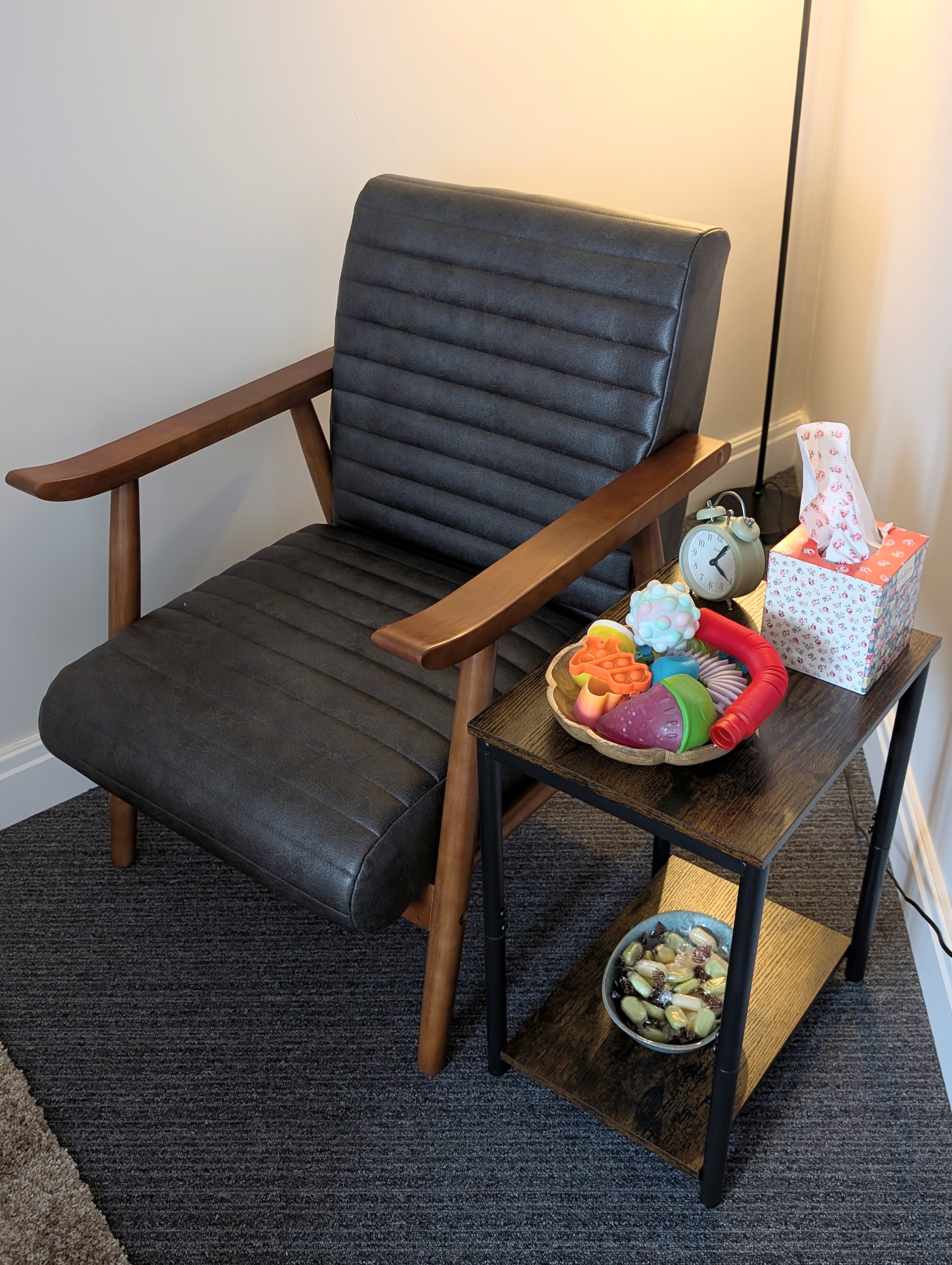 Client chair with fidget tools and tissues